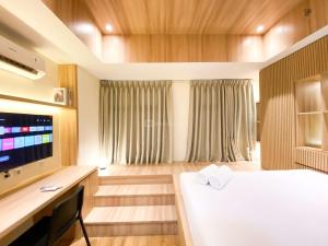 Good and Cozy Studio at Pollux Chadstone Apartment By Travelio