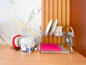 Cozy Living Studio (No Kitchen) at Sentraland Semarang Apartment By Travelio