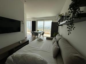 Appartamento con 1 Camera da Letto e Vasca da Bagno Idromassaggio all’Ultimo Piano