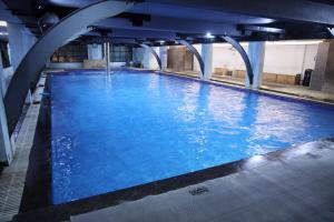 Zing Rooms by GuestHouse Suites