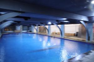 Zing Rooms by GuestHouse Suites