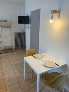 Appartements Studio chaleureux rez de chaussee : photos des chambres