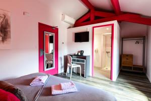 Hotels Logis L'Auberge de Larressingle : photos des chambres