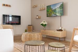 Appartements Appartement Premium jacuzzi terrasse climatisation : photos des chambres