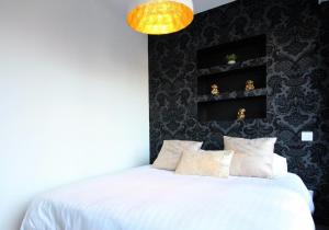 Appartements Art Bay 2 velos parking : photos des chambres