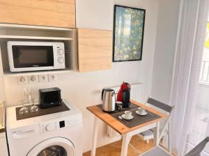 Appartements Studio a 3 min Gare Massy-TGV : photos des chambres