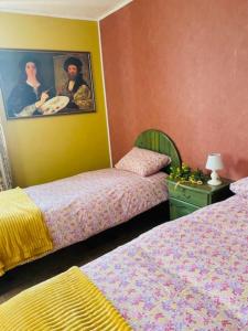 Maisons de vacances Casa con piscina e giardino : photos des chambres