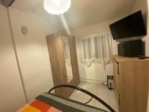 Appartements Charmant T2 avec Terrasse, Clim, Parking et Wifi - FR-1-503-155 : photos des chambres