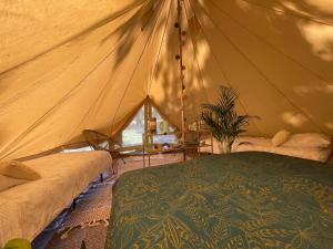 Tentes de luxe Tente boheme - O Sens en Eveil : photos des chambres