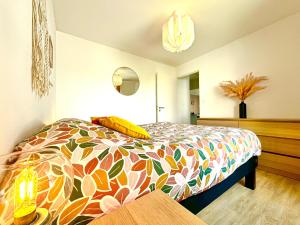 Appartements L'atelier Chic - Wifi fibre - Parking privee - Balcon - NETFLIX : photos des chambres