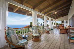 Experience ocean views at Hale Mauka, a spacious 3-bedroom retreat in Captain Cook, HI.