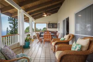 Experience ocean views at Hale Mauka, a spacious 3-bedroom retreat in Captain Cook, HI.