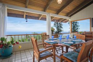 Experience ocean views at Hale Mauka, a spacious 3-bedroom retreat in Captain Cook, HI.