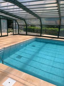 Appartements La Suite Unique - Le jardin sur les Pyrenees- vue panoramique montagne -jardin cloture prive de 100m2-Parking-Linge de lit et serviettes compris- : photos des chambres