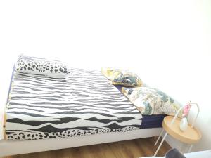 Sejours chez l'habitant Family-friendly First-class Appartment : photos des chambres