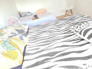 Sejours chez l'habitant Family-friendly First-class Appartment : photos des chambres
