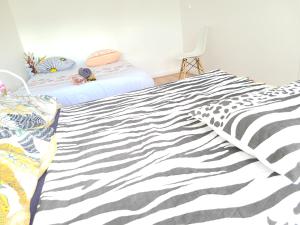 Sejours chez l'habitant Family-friendly First-class Appartment : photos des chambres
