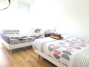 Sejours chez l'habitant Family-friendly First-class Appartment : photos des chambres