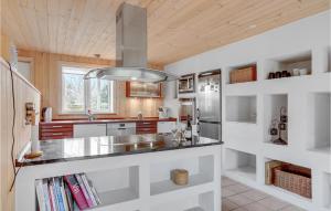 Nice Home In Rødby With Sauna