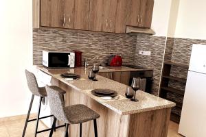 Danaos Seaside Suite 103 with Pool in Tourist Area