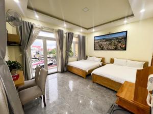 Phòng Deluxe Đôi Với 2 Giường Đôi (Deluxe Double Room with Two Double Beds)