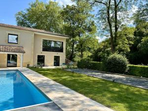 Maisons de vacances La Maison L'Eperon, stylish 5 star villa surrounded by vineyard near Saint Emilion : photos des chambres
