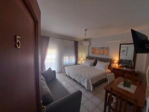 Elenis Apartments Igoumenitsa - Γκαρσονιέρα 1ου ορόφου επιπλωμένη, εξοπλισμένη