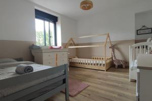Maisons de vacances Maison familiale avec jardin 12- Disney 40-Paris : photos des chambres