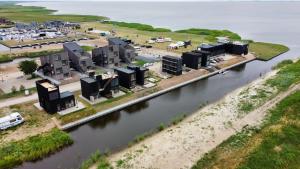 AITVARU TERASOS apartamentai pirmame aukšte su terasa į kanalą