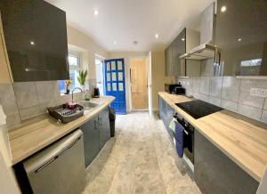 Apartment with a Private Garden and Modern kitchen