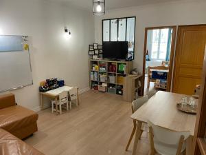 Cosy et familiale dans le Marais