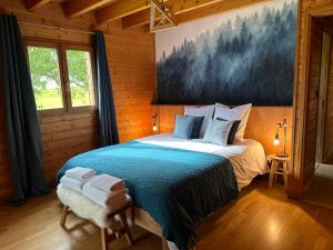 Maisons de vacances Chalet dans un ecrin de verdure avec SPA privatif : photos des chambres