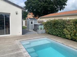 Maisons de vacances Jolie maison contemporaine avec piscine : photos des chambres