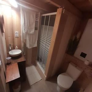 Chalets La cabane en bois : photos des chambres