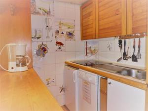 Résidence Le Palafour - Studio 5 personnes à Tignes au pied des pistes, des commerces, de lESF et de loffice du tourisme dans le quartier du lac. App MAE-2052