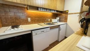 Résidence Chasseforet - Appartement 2 pièces 4 personnes situé à Méribel sur la route des Chalets proche des pistes MAE-2107