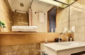 Résidence Divaria - Studio 4 personnes à Tignes au pied des pistes et proche des commerces dans le quartier du Lac. MAE-2136