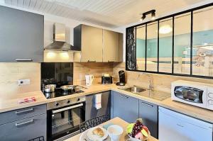 Résidence Les Hauts Lieux - Joli studio cabine 4 personnes à Tignes au pied des commerces et proche des pistes,avec vue imprenable sur le lac et le glacier MAE-2634