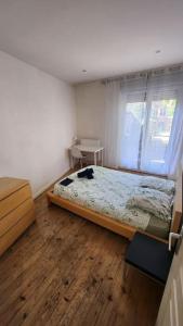 T3 Petit Confort - proche commodités - Parking privé