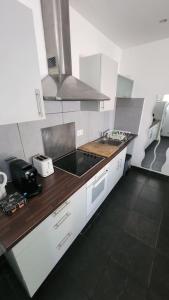 T3 Petit Confort - proche commodités - Parking privé