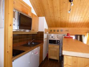 Résidence Les Genelles - Appartement 3 Pièces situé à Méribel Altiport au pied des pistes de ski et proche du golf MAE-6691