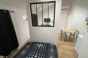 Appartements Studio tout confort avec climatisation : photos des chambres