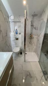 Appartements Studio tout confort avec climatisation : photos des chambres