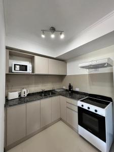 departamento complejo Veneto Village vista al lago