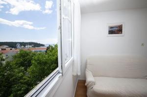 Apartments by the sea Makarska - 23419