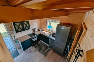 Szary Domek 2 jacuzzi sauna kominek klimatyzacja jezioro basen