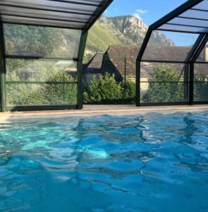 Appartements La Suite Unique - Le jardin sur les Pyrenees- vue panoramique montagne -jardin cloture prive de 100m2-Parking-Linge de lit et serviettes compris- : photos des chambres