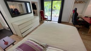 Villas Maison, Piscine, Jardin & Calme : photos des chambres