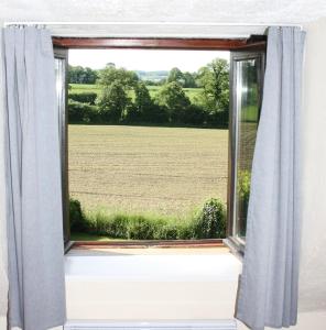 Maisons de vacances Daisy Cottage with seasonal Swimming Pool : photos des chambres
