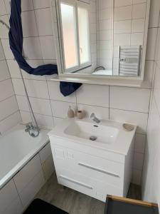Appartements T2 Cosy - 70m2 au Coeur de ville : photos des chambres